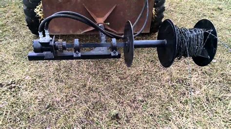 homemade hydraulic wire roller for skid steer|Barbwire spooler or winder home made. PTO driven.